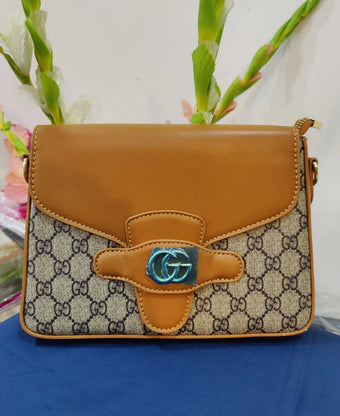 compare product Sophisticated Monogram Canvas Shoulder Bag with Classic Tan Leather Trim