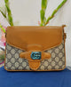 Sophisticated Monogram Canvas Shoulder Bag with Classic Tan Leather Trim