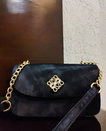 compare product Luxe Quilted Black Evening Bag with Ornate Gold Emblem and Chain Strap