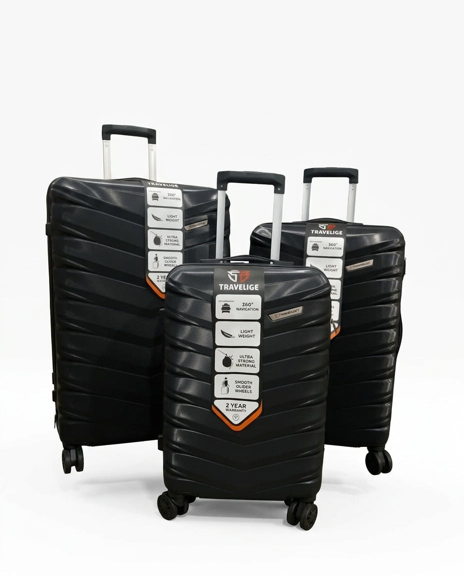 TRAVELIGE black 3-piece hard-shell luggage set with diagonal textured design, spinner wheels and telescopic handles.